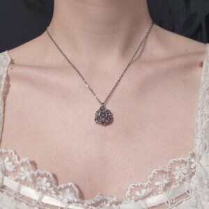 Silver and purple flower necklace with a small silver chain